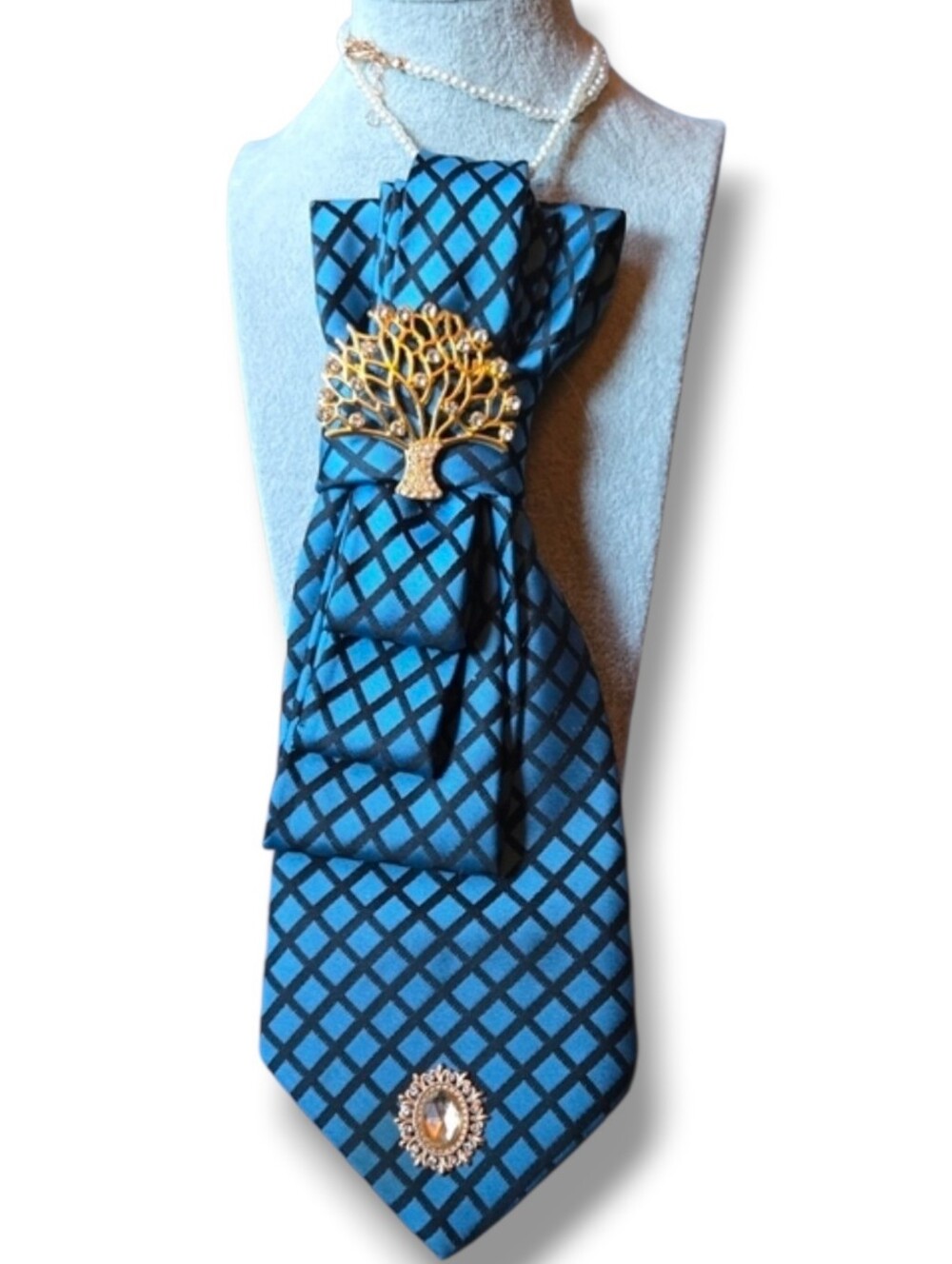 3/$60 Blue and Black Lattice Pattern Cravat with Gold Tree Brooch